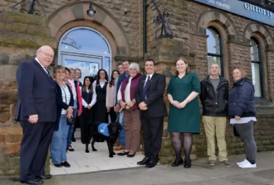 group of people outside of church building