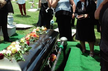 What do prepaid funeral plans involve?